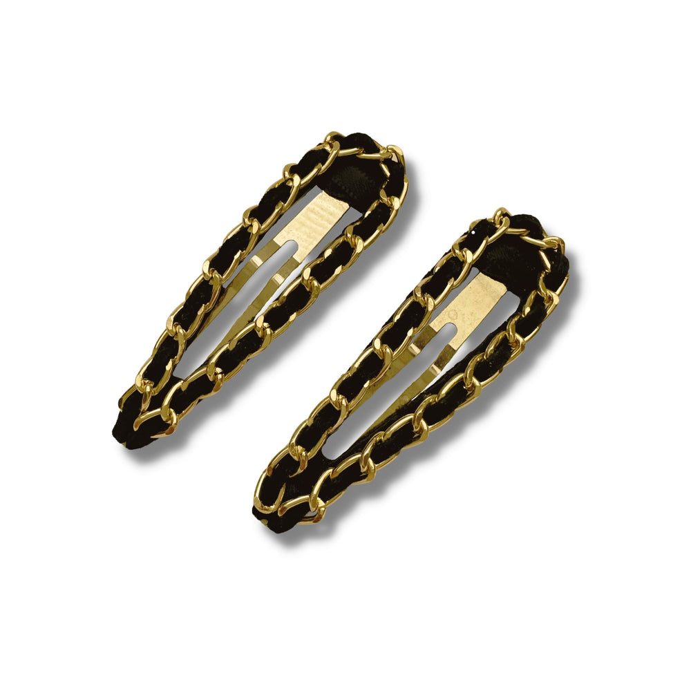 Mia Beauty Snip Snaps in black suede and yellow gold chains top view