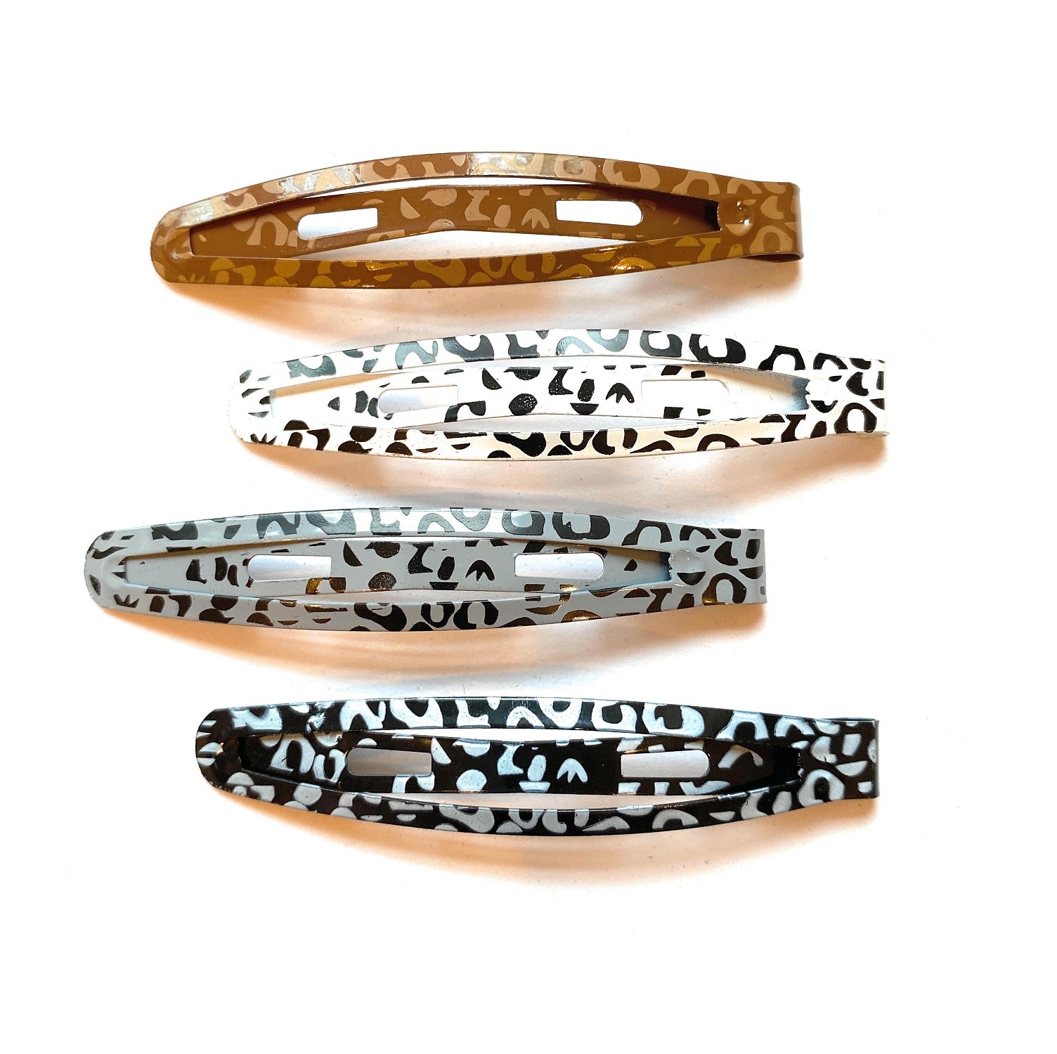Mia® Snip Snaps® hair barrettes in leopard print in brown, white, gray and black colors