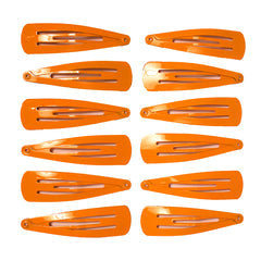 Mia® Spirit Line Snip Snaps® high gloss paint - orange color - 12 pieces shown out of the packaging - designed by #MiaKaminski of #MiaBeauty #beauty #hair #hairclips #hairaccessories #barrettes