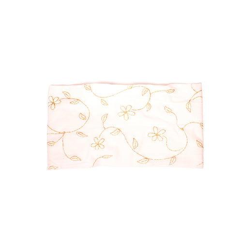 Mia® Cloth Headband Made in Italy - white with metallic gold flowers - lying flat - designed by #MiaKaminski of Mia Beauty