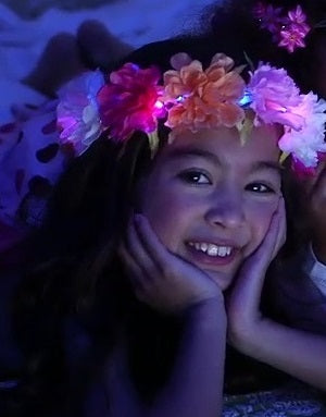Mia® Beauty Flashion Flowers - LED lighted headband - mixed peonies shown on model from commercial